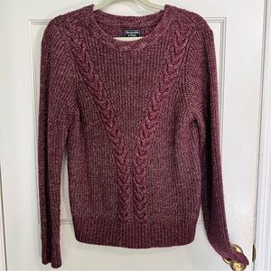 Burgundy cable relaxed fit sweater.